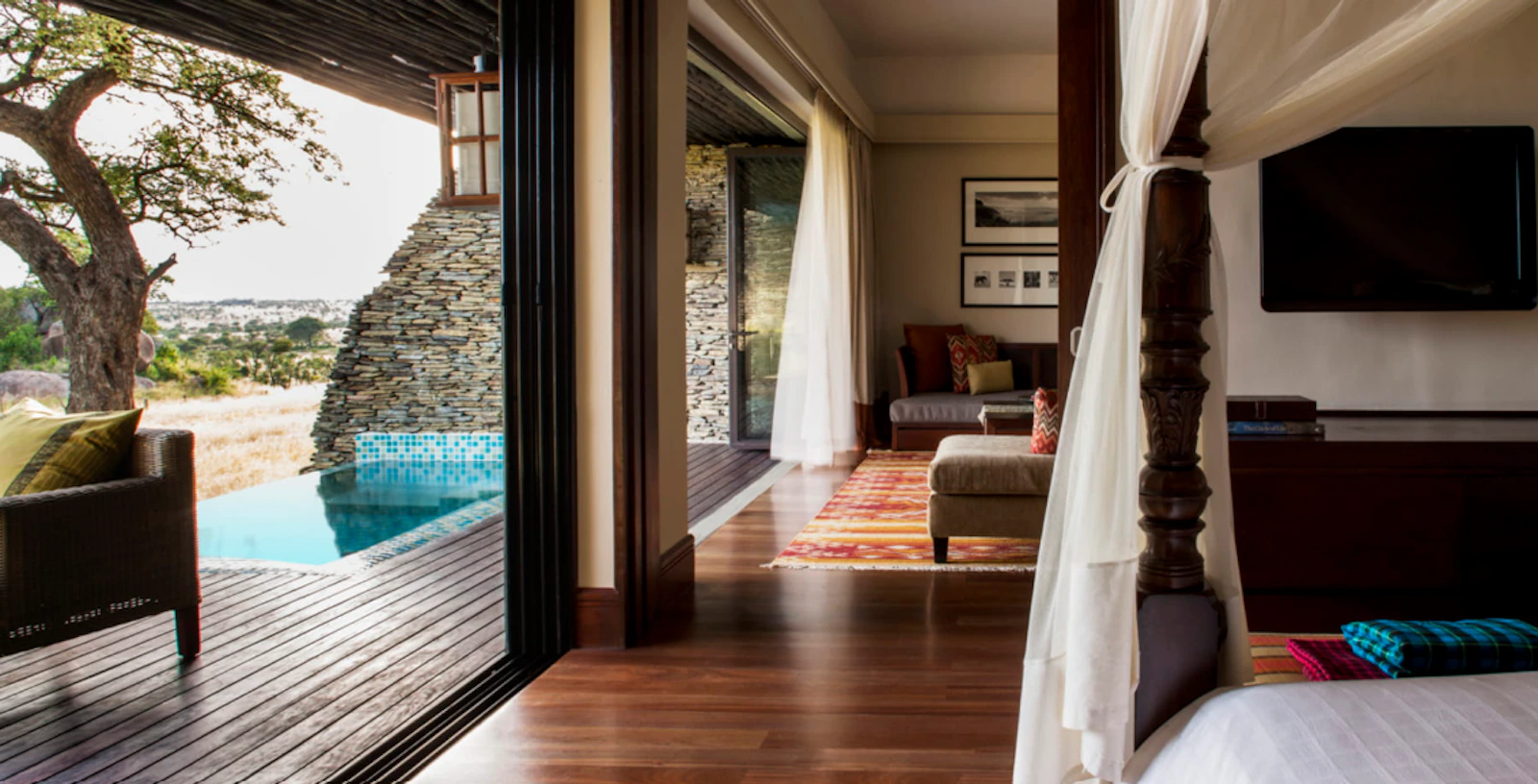 Guest room and terrace beside a private pool at Four Seasons Safari Lodge Serengeti