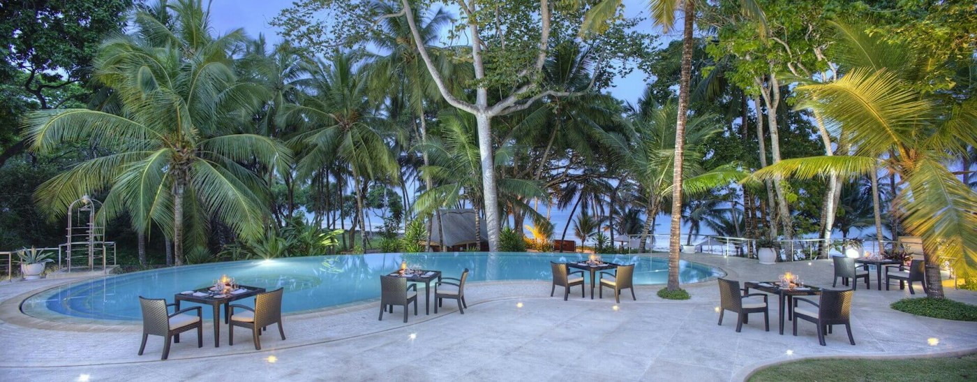 Swimming pool and garden tables at Almanara