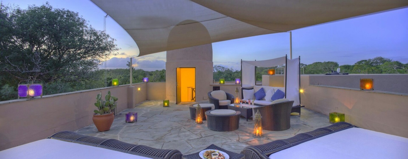 Rooftop terrace at dusk at Almanara