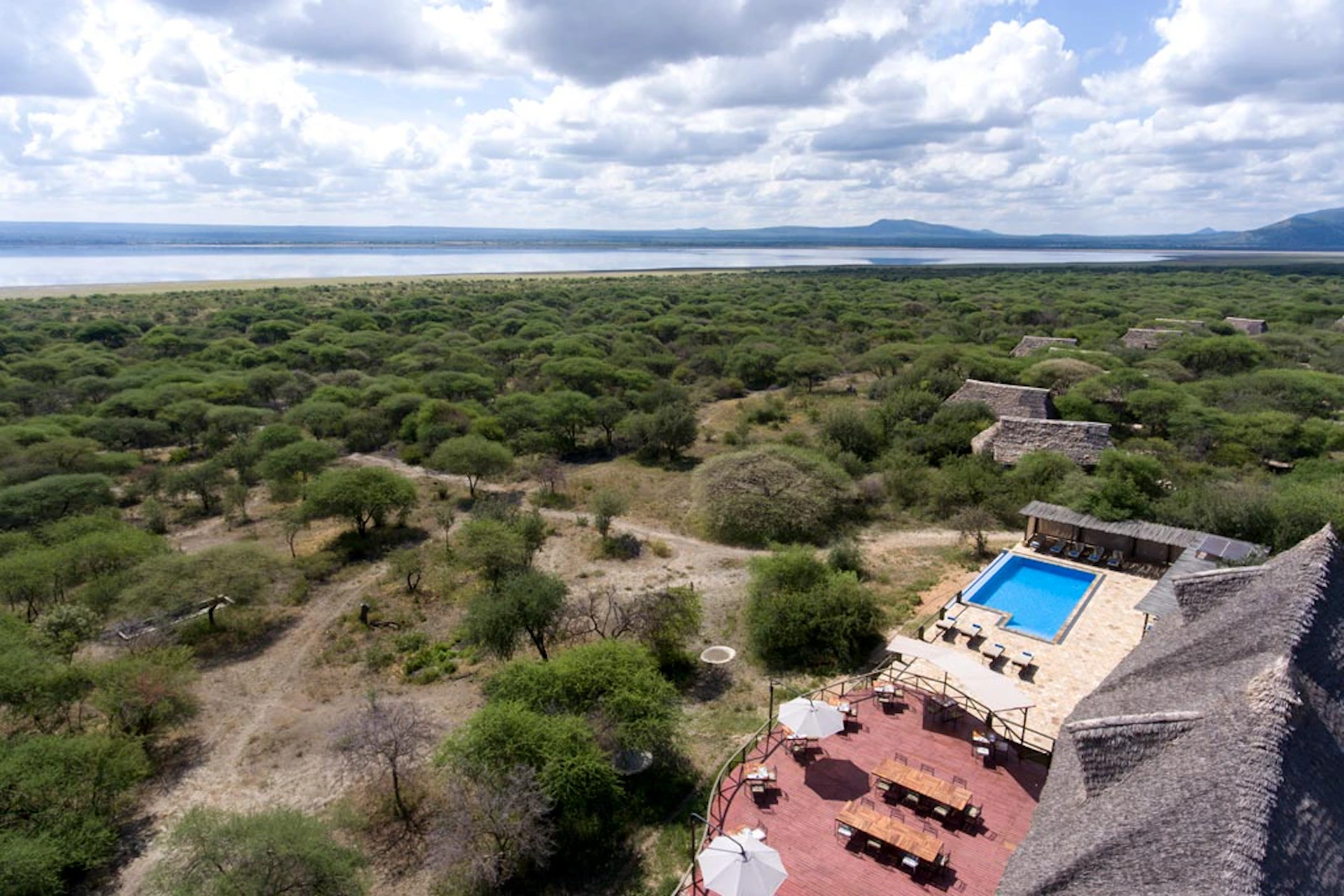 Aerial view of the main lodge and pool at Burunge Tented Lodge