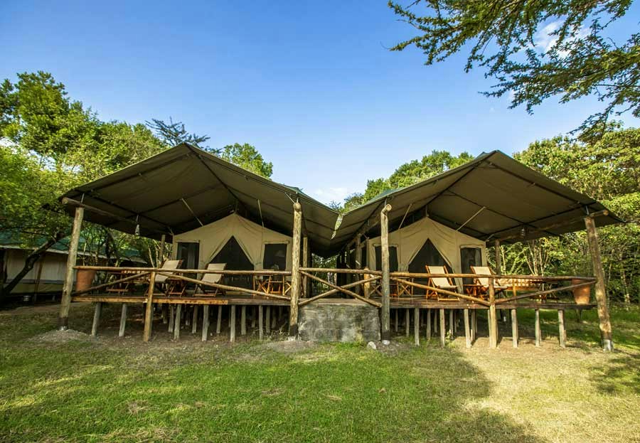 Family tents and verandas in the camp grounds at Karen Blixen Camp