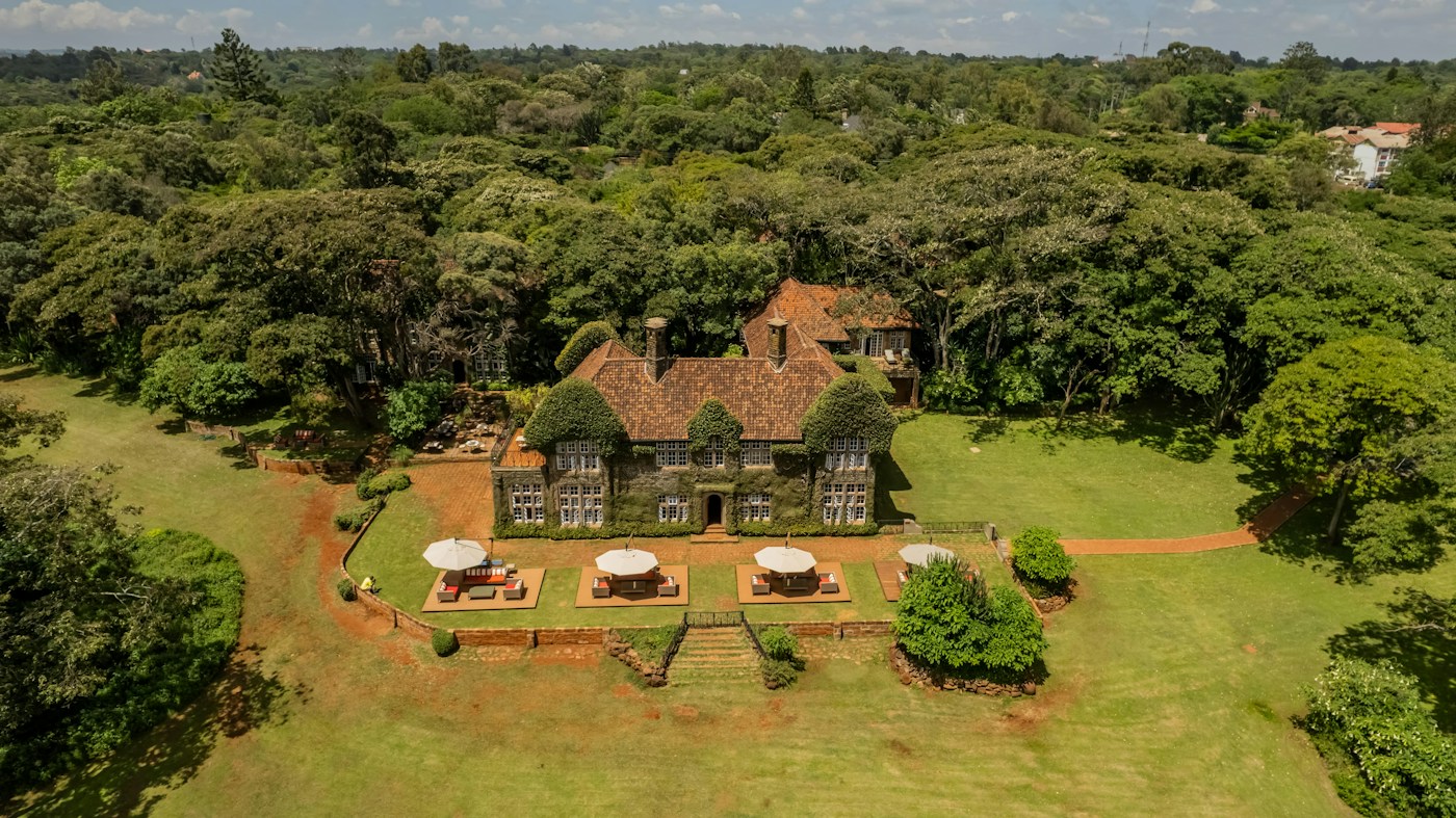 Aerial view of the manor and surrounding gardens at Giraffe Manor