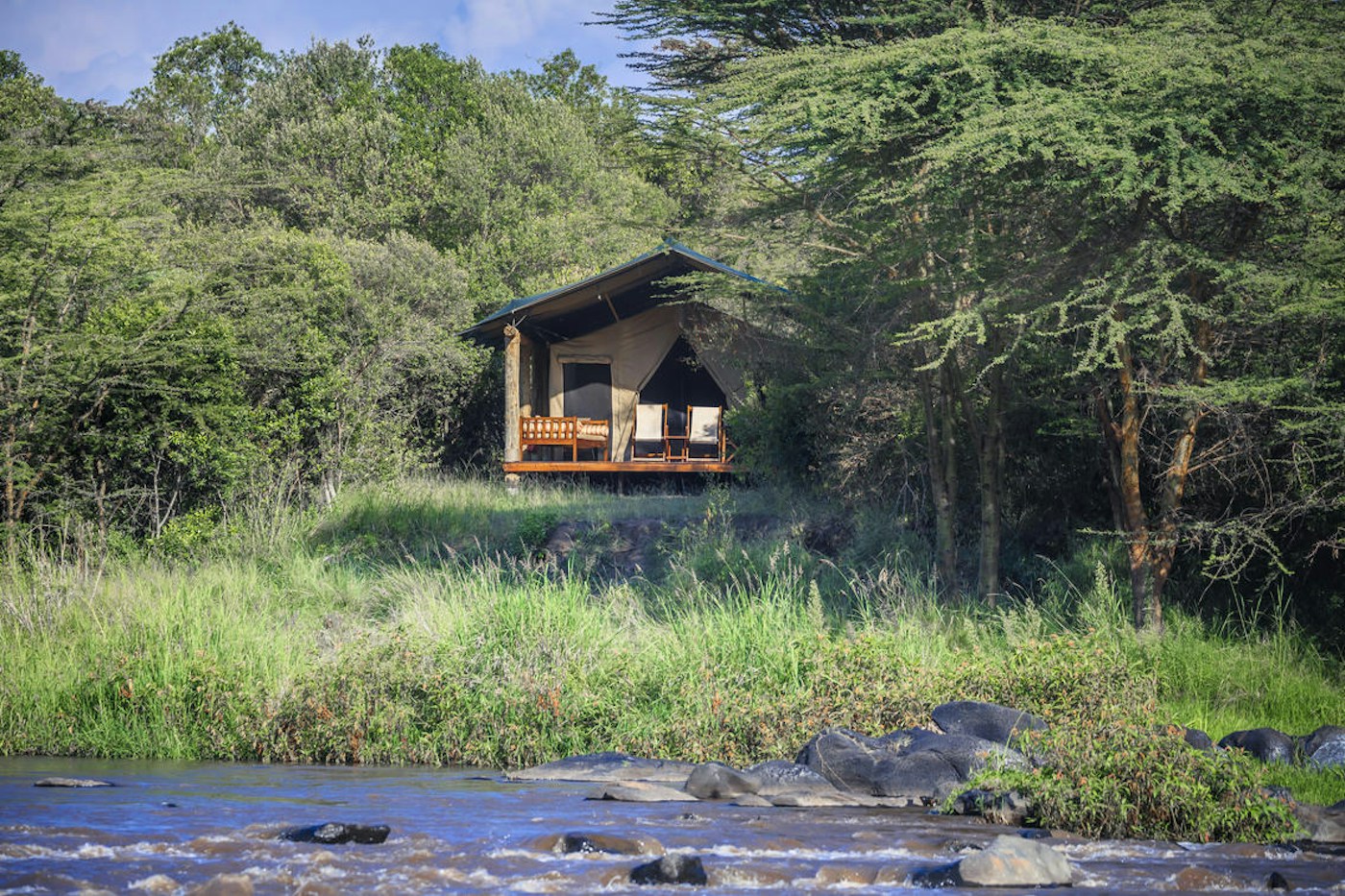 Guest tent beside the Mara River at Karen Blixen Camp