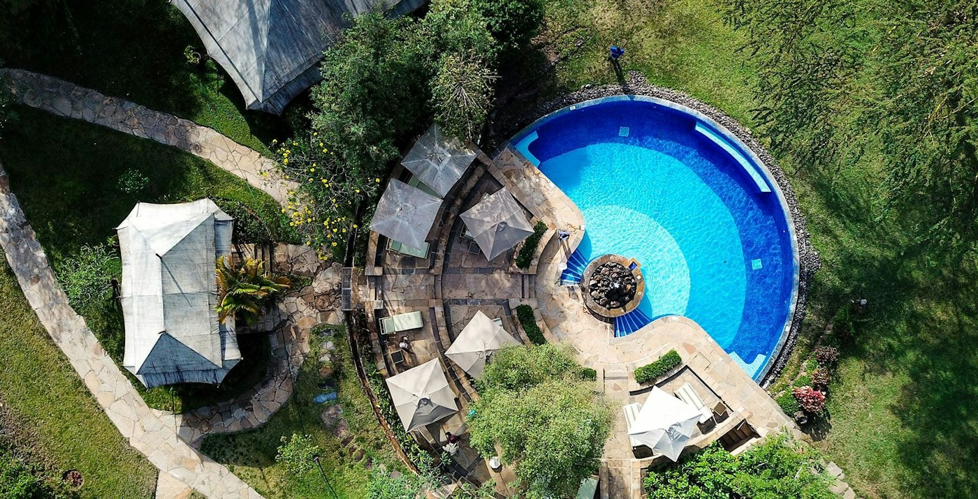 Aerial view of the swimming pool and loungers at Lake Elmenteita Serena Camp