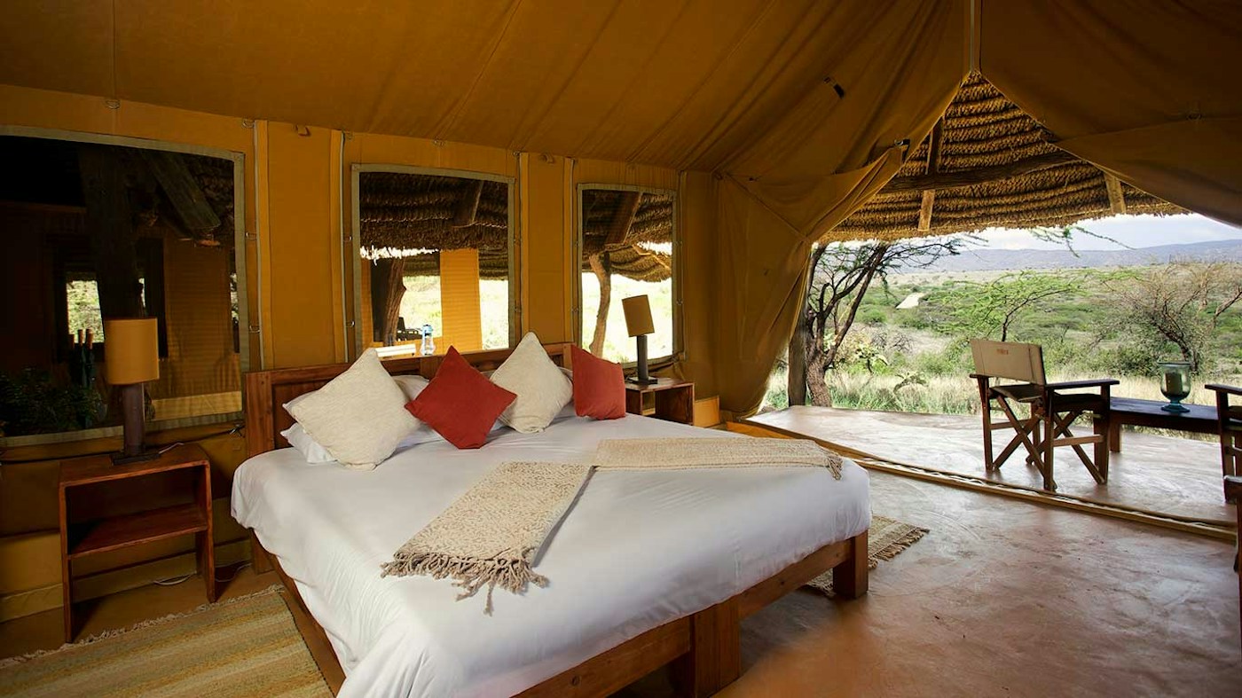 Double bed inside a canvas guest tent at Lewa Safari Camp