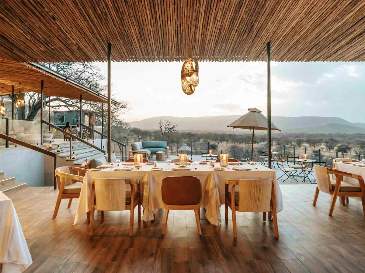 Open-sided dining deck at Nimali Central Serengeti overlooking the plains