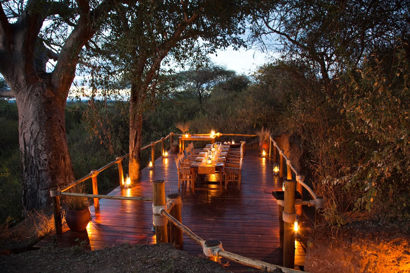Candlelit dining deck at Oliver's Camp