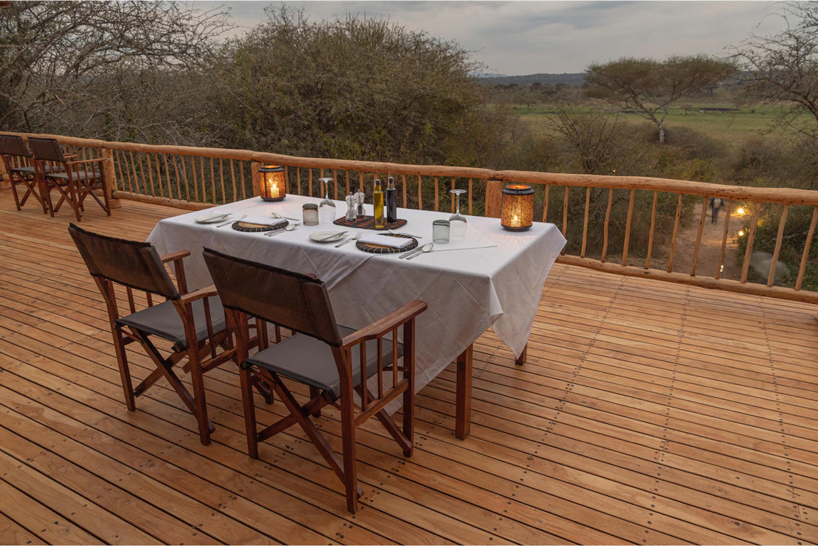 Private dining table on the deck at Oliver's Camp
