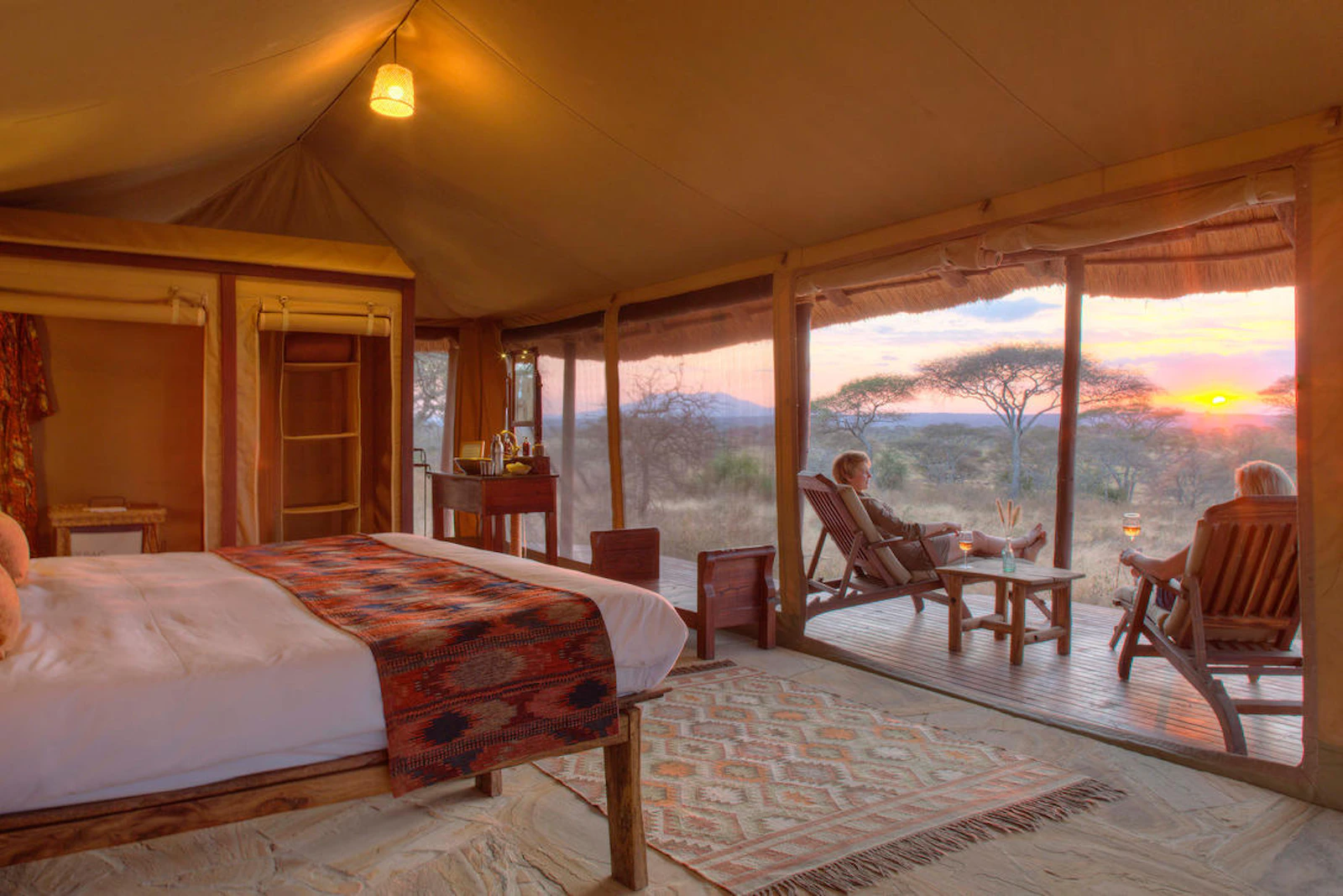 Tented bedroom overlooking the landscape at Oliver's Camp