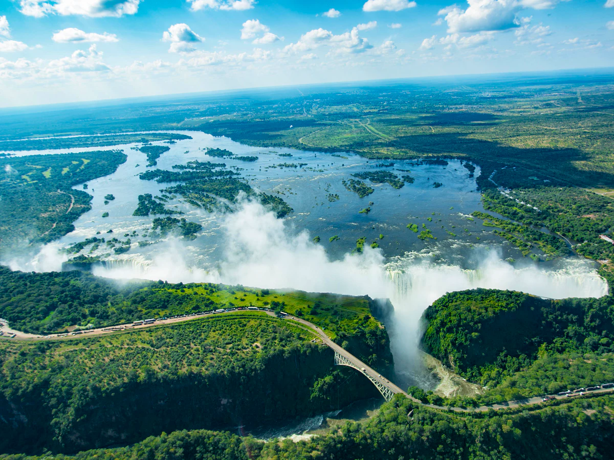 Aerial view of Victoria Falls, its gorge and the broad Zambezi River