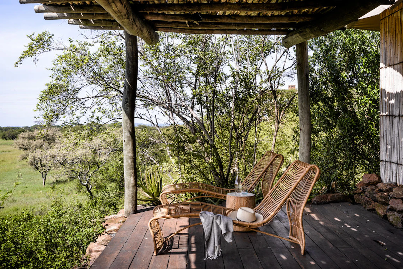 Guest deck overlooking the trees at Singita Faru Faru Lodge