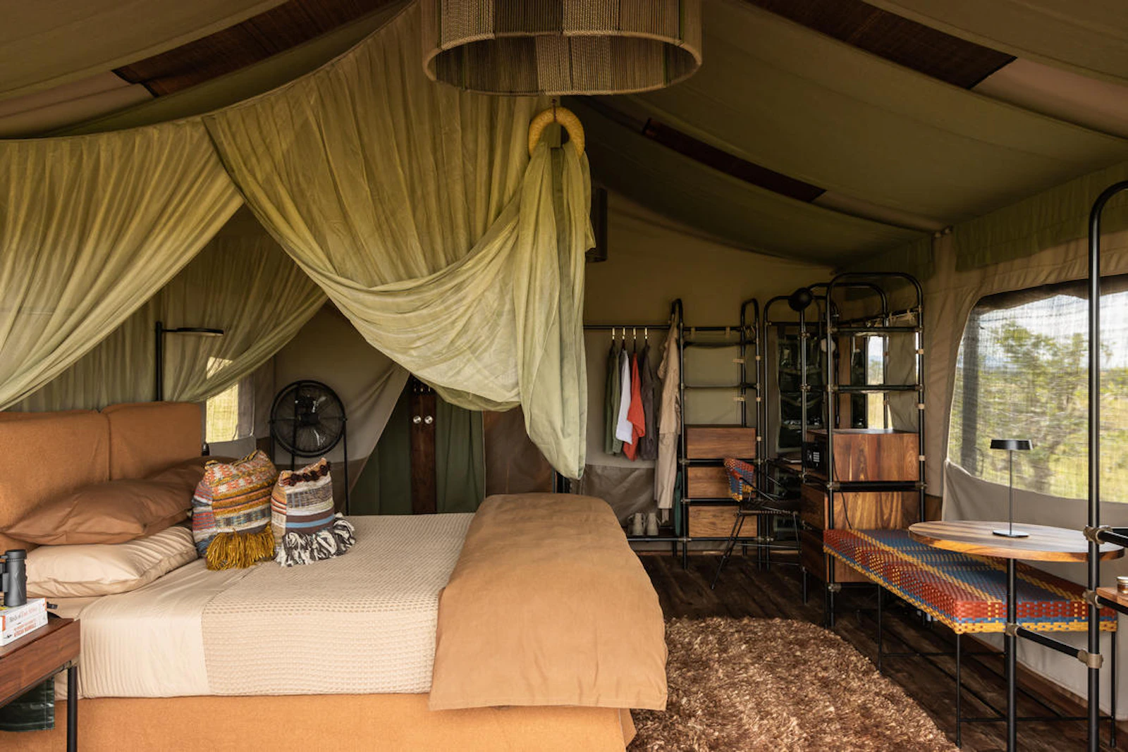 Tented bedroom at Singita Mara River Tented Camp