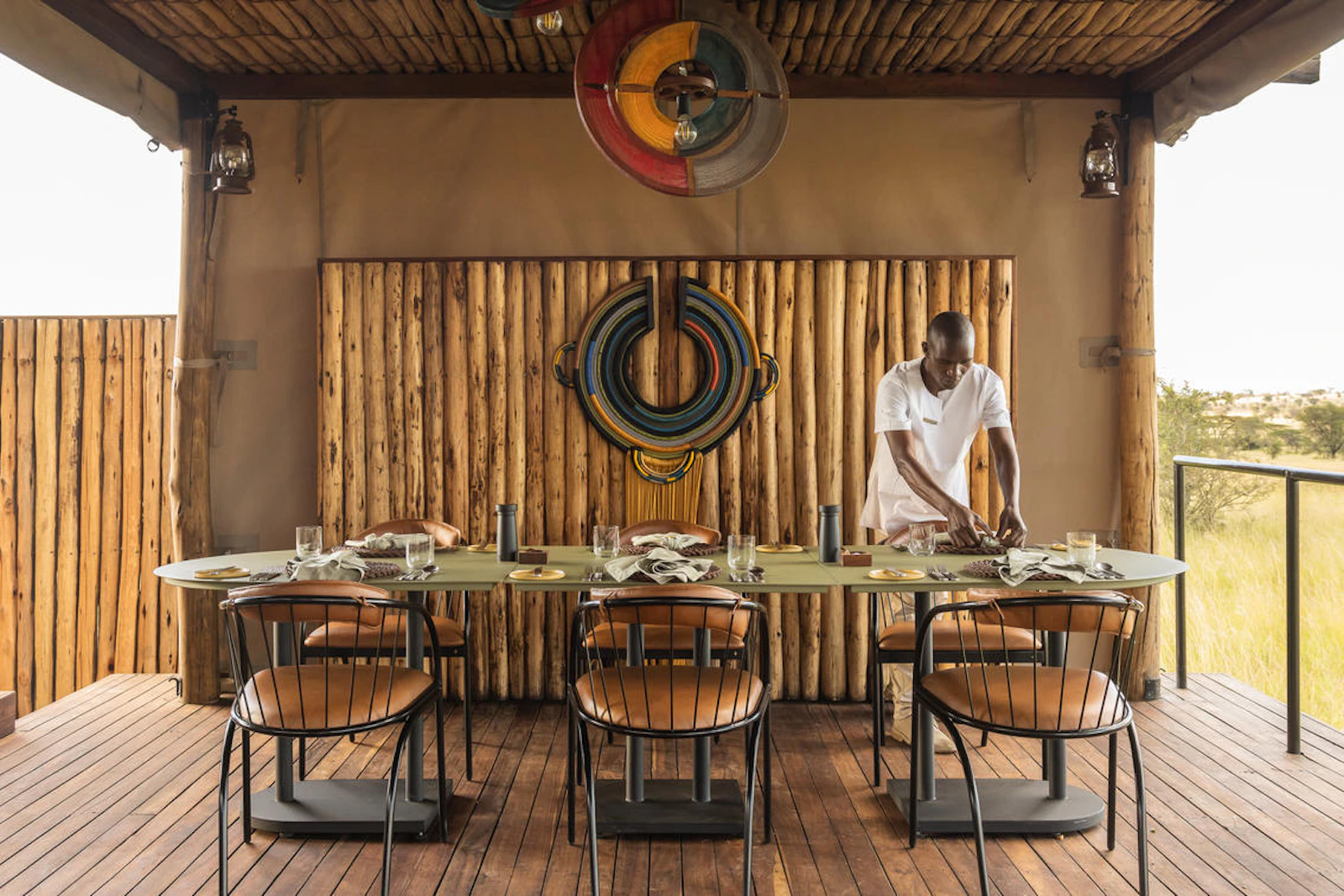 Dining table in the main tent at Singita Mara River Tented Camp