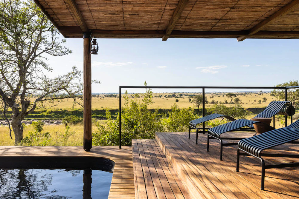 A private plunge pool and sun deck overlooking the Serengeti plains, Tanzania
